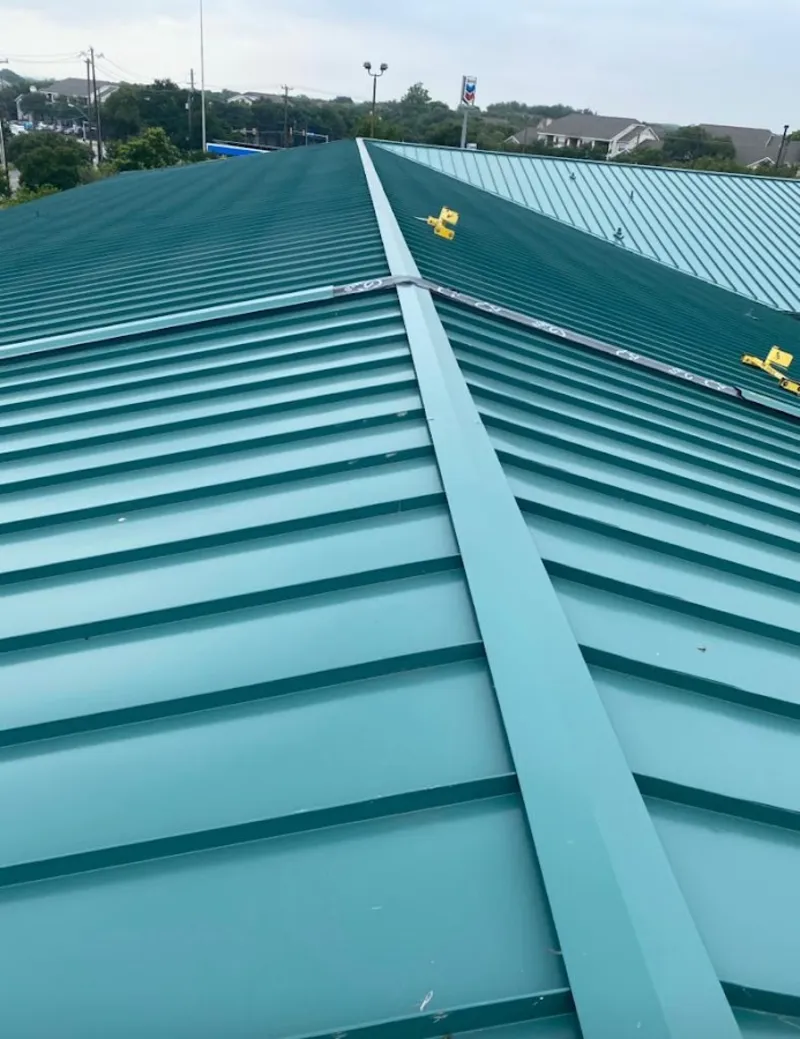 Green commercial metal roof ridge and valley for Metal Roof Repair in Poughkeepsie